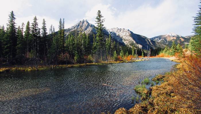 A photo of the wheel of natural energy in the mountains, water, wind, trees in Kananaskis, Alberta, Canada, a great place for chakra energy healing.