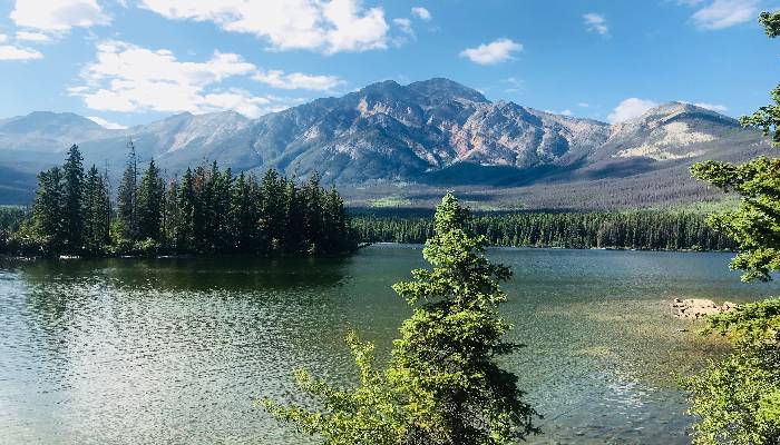 A photo of Pyramid Island, Jasper, Alberta, Canada. A place of retreat where I could read a book on the Presence Process and learn why positive thinking doesn't work.