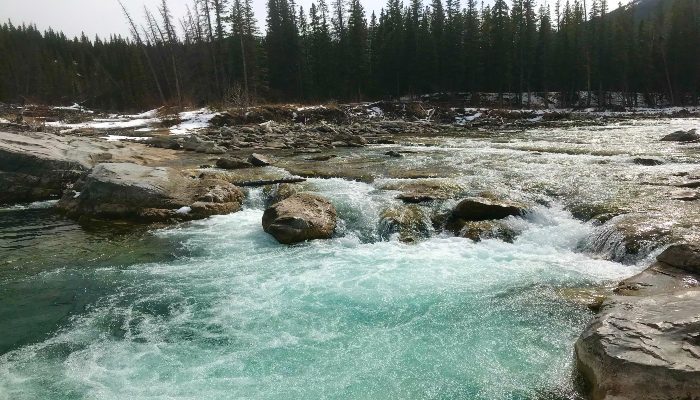 A photo of the churning waters at Elbow Falls, Bragg Creek, Alberta, Canada. Our minds churn like this, and letting go of drama isn't that easy.